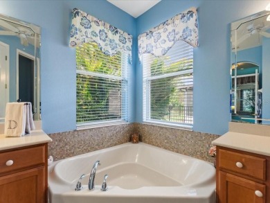 Excellent VALUE on this BEAUTIFUL CONSERVATION LOT HOME with the on Stonegate Golf Club in Florida - for sale on GolfHomes.com, golf home, golf lot
