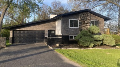 Welcome home to this Beautiful updated 4 bedroom, 2 bath home for sale on GolfHomes.com