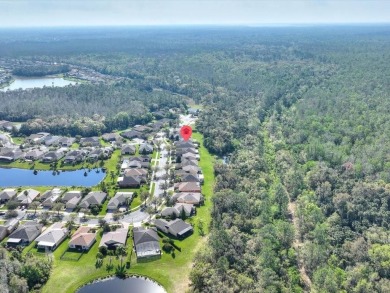 Excellent VALUE on this BEAUTIFUL CONSERVATION LOT HOME with the on Stonegate Golf Club in Florida - for sale on GolfHomes.com, golf home, golf lot