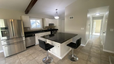 Welcome home to this Beautiful updated 4 bedroom, 2 bath home on Lakes of the Four Seasons Country Club in Indiana - for sale on GolfHomes.com, golf home, golf lot