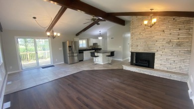 Welcome home to this Beautiful updated 4 bedroom, 2 bath home on Lakes of the Four Seasons Country Club in Indiana - for sale on GolfHomes.com, golf home, golf lot