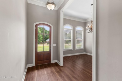 Welcome to this fantastic home on a spacious corner lot, just on Lake Caroline Golf Club in Mississippi - for sale on GolfHomes.com, golf home, golf lot