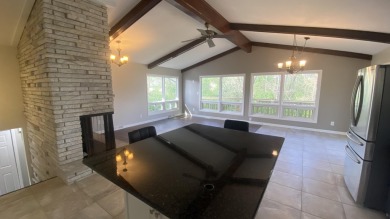 Welcome home to this Beautiful updated 4 bedroom, 2 bath home on Lakes of the Four Seasons Country Club in Indiana - for sale on GolfHomes.com, golf home, golf lot