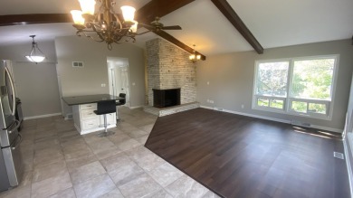 Welcome home to this Beautiful updated 4 bedroom, 2 bath home on Lakes of the Four Seasons Country Club in Indiana - for sale on GolfHomes.com, golf home, golf lot