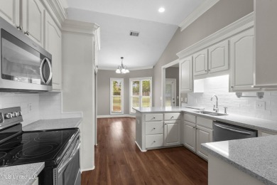 Welcome to this fantastic home on a spacious corner lot, just on Lake Caroline Golf Club in Mississippi - for sale on GolfHomes.com, golf home, golf lot
