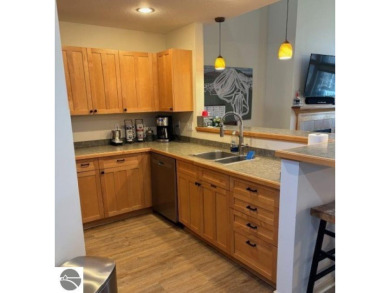 This condominium should be featured in a catalog! Remodeled on Cedar River Golf Course in Michigan - for sale on GolfHomes.com, golf home, golf lot