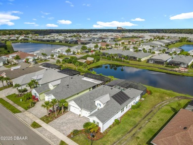 A Masterpiece of indoor-outdoor living in Latitude on LPGA International Golf Course in Florida - for sale on GolfHomes.com, golf home, golf lot
