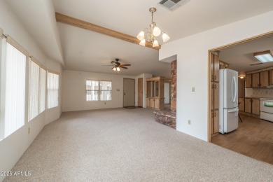 Nicely maintained home. Vinyl plank flooring in entry, kitchen on Oakwood Golf Club  in Arizona - for sale on GolfHomes.com, golf home, golf lot
