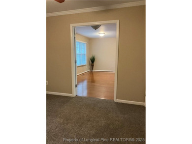 NEW PRICE/NEW PAINT AND CARPET/THIS HOME IS PRICED BELOW TAX on Carolina Trace Country Club in North Carolina - for sale on GolfHomes.com, golf home, golf lot