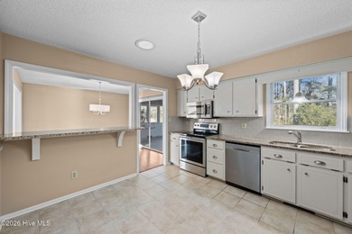 Welcome home to this 3-bedroom, 2-bath residence in the on River Bend Golf and Country Club in North Carolina - for sale on GolfHomes.com, golf home, golf lot