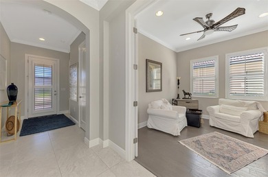 Discover the epitome of luxury living in this stunning Key Largo on Sarasota National Golf Club in Florida - for sale on GolfHomes.com, golf home, golf lot