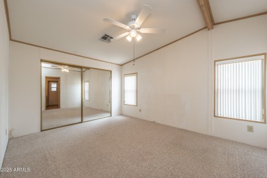 Nicely maintained home. Vinyl plank flooring in entry, kitchen on Oakwood Golf Club  in Arizona - for sale on GolfHomes.com, golf home, golf lot