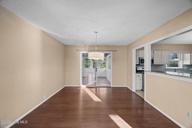 Welcome home to this 3-bedroom, 2-bath residence in the on River Bend Golf and Country Club in North Carolina - for sale on GolfHomes.com, golf home, golf lot