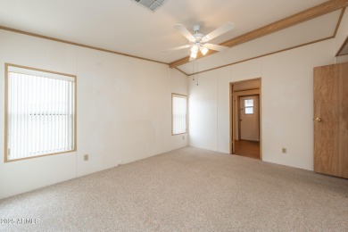 Nicely maintained home. Vinyl plank flooring in entry, kitchen on Oakwood Golf Club  in Arizona - for sale on GolfHomes.com, golf home, golf lot