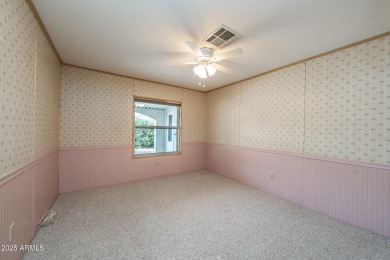 Nicely maintained home. Vinyl plank flooring in entry, kitchen on Oakwood Golf Club  in Arizona - for sale on GolfHomes.com, golf home, golf lot