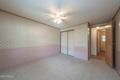Nicely maintained home. Vinyl plank flooring in entry, kitchen on Oakwood Golf Club  in Arizona - for sale on GolfHomes.com, golf home, golf lot
