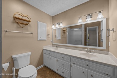 Welcome home to this 3-bedroom, 2-bath residence in the on River Bend Golf and Country Club in North Carolina - for sale on GolfHomes.com, golf home, golf lot