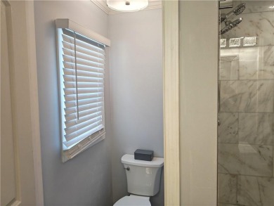 No HOA - Discover the perfect blend of contemporary elegance and on Charlie Yates Golf Course in Georgia - for sale on GolfHomes.com, golf home, golf lot