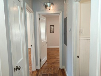 No HOA - Discover the perfect blend of contemporary elegance and on Charlie Yates Golf Course in Georgia - for sale on GolfHomes.com, golf home, golf lot