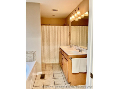 NEW PRICE/NEW PAINT AND CARPET/THIS HOME IS PRICED BELOW TAX on Carolina Trace Country Club in North Carolina - for sale on GolfHomes.com, golf home, golf lot