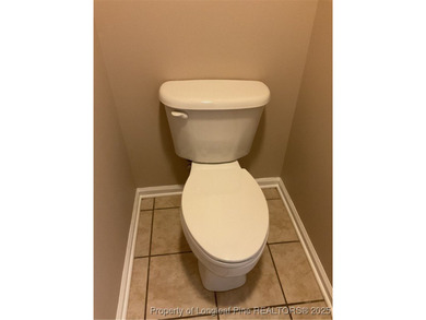 NEW PRICE/NEW PAINT AND CARPET/THIS HOME IS PRICED BELOW TAX on Carolina Trace Country Club in North Carolina - for sale on GolfHomes.com, golf home, golf lot