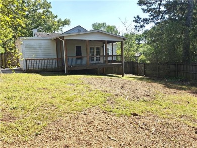 No HOA - Discover the perfect blend of contemporary elegance and on Charlie Yates Golf Course in Georgia - for sale on GolfHomes.com, golf home, golf lot