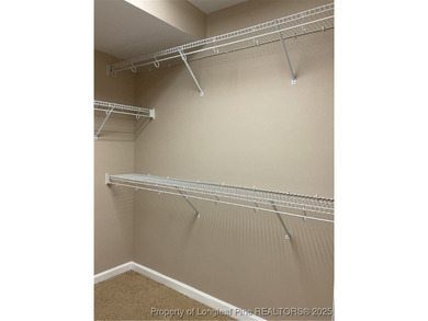 NEW PRICE/NEW PAINT AND CARPET/THIS HOME IS PRICED BELOW TAX on Carolina Trace Country Club in North Carolina - for sale on GolfHomes.com, golf home, golf lot