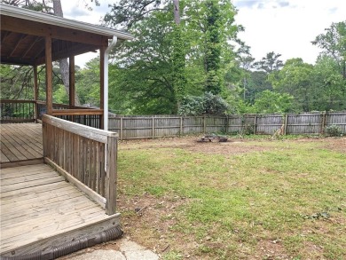 No HOA - Discover the perfect blend of contemporary elegance and on Charlie Yates Golf Course in Georgia - for sale on GolfHomes.com, golf home, golf lot