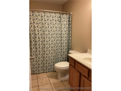 NEW PRICE/NEW PAINT AND CARPET/THIS HOME IS PRICED BELOW TAX on Carolina Trace Country Club in North Carolina - for sale on GolfHomes.com, golf home, golf lot