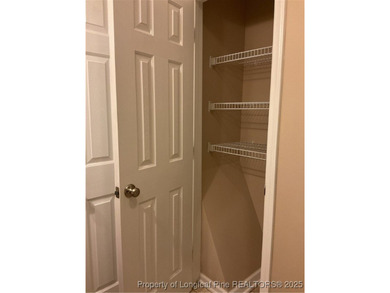 NEW PRICE/NEW PAINT AND CARPET/THIS HOME IS PRICED BELOW TAX on Carolina Trace Country Club in North Carolina - for sale on GolfHomes.com, golf home, golf lot