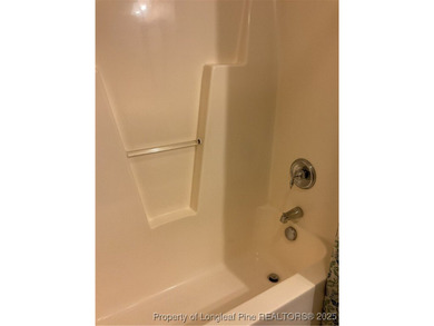 NEW PRICE/NEW PAINT AND CARPET/THIS HOME IS PRICED BELOW TAX on Carolina Trace Country Club in North Carolina - for sale on GolfHomes.com, golf home, golf lot