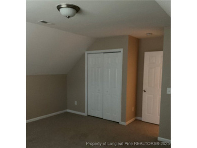 NEW PRICE/NEW PAINT AND CARPET/THIS HOME IS PRICED BELOW TAX on Carolina Trace Country Club in North Carolina - for sale on GolfHomes.com, golf home, golf lot