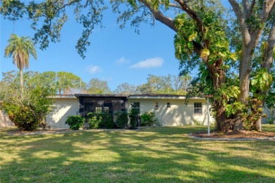 Under contract-accepting backup offers. Welcome to your dream on The Dunedin Country Club in Florida - for sale on GolfHomes.com, golf home, golf lot