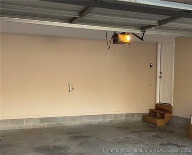 NEW PRICE/NEW PAINT AND CARPET/THIS HOME IS PRICED BELOW TAX on Carolina Trace Country Club in North Carolina - for sale on GolfHomes.com, golf home, golf lot