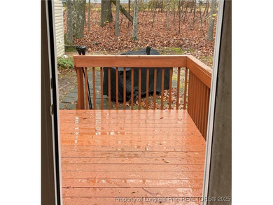 NEW PRICE/NEW PAINT AND CARPET/THIS HOME IS PRICED BELOW TAX on Carolina Trace Country Club in North Carolina - for sale on GolfHomes.com, golf home, golf lot