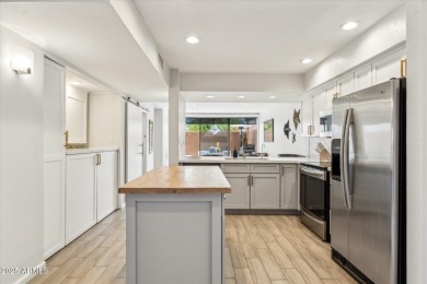 This furnished residence is ideally located just five minutes on McCormick Ranch Golf Club in Arizona - for sale on GolfHomes.com, golf home, golf lot