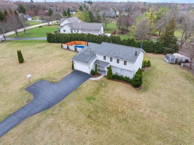 Simply stunning is this breathtaking four-bedroom, two and a on Chapel Hill Country Club in Illinois - for sale on GolfHomes.com, golf home, golf lot