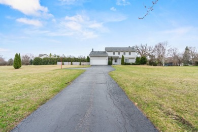 Simply stunning is this breathtaking four-bedroom, two and a on Chapel Hill Country Club in Illinois - for sale on GolfHomes.com, golf home, golf lot