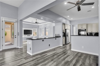 Welcome to this single-story residence located behind the gates on Red Rock Country Club in Nevada - for sale on GolfHomes.com, golf home, golf lot