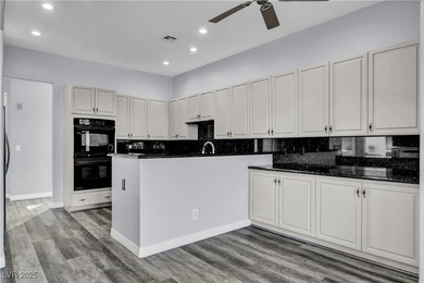 Welcome to this single-story residence located behind the gates on Red Rock Country Club in Nevada - for sale on GolfHomes.com, golf home, golf lot