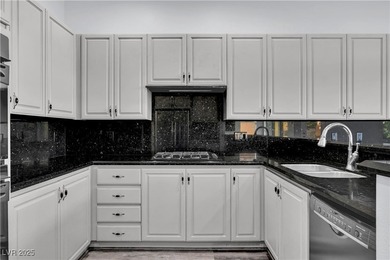 Welcome to this single-story residence located behind the gates on Red Rock Country Club in Nevada - for sale on GolfHomes.com, golf home, golf lot