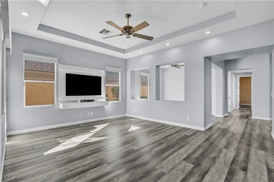 Welcome to this single-story residence located behind the gates on Red Rock Country Club in Nevada - for sale on GolfHomes.com, golf home, golf lot