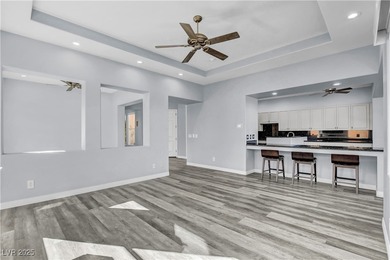 Welcome to this single-story residence located behind the gates on Red Rock Country Club in Nevada - for sale on GolfHomes.com, golf home, golf lot