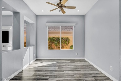 Welcome to this single-story residence located behind the gates on Red Rock Country Club in Nevada - for sale on GolfHomes.com, golf home, golf lot