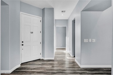 Welcome to this single-story residence located behind the gates on Red Rock Country Club in Nevada - for sale on GolfHomes.com, golf home, golf lot