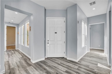 Welcome to this single-story residence located behind the gates on Red Rock Country Club in Nevada - for sale on GolfHomes.com, golf home, golf lot