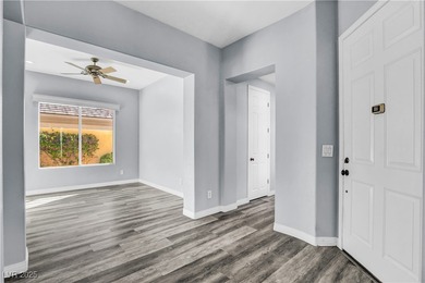 Welcome to this single-story residence located behind the gates on Red Rock Country Club in Nevada - for sale on GolfHomes.com, golf home, golf lot