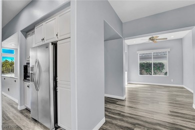 Welcome to this single-story residence located behind the gates on Red Rock Country Club in Nevada - for sale on GolfHomes.com, golf home, golf lot