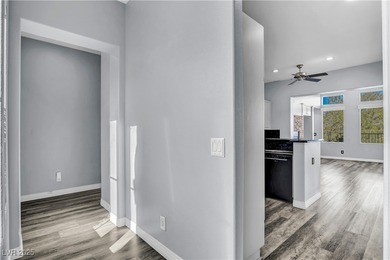 Welcome to this single-story residence located behind the gates on Red Rock Country Club in Nevada - for sale on GolfHomes.com, golf home, golf lot