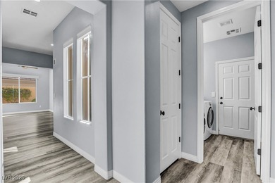 Welcome to this single-story residence located behind the gates on Red Rock Country Club in Nevada - for sale on GolfHomes.com, golf home, golf lot